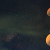 astrophotography red and white tower with satellites under milky way