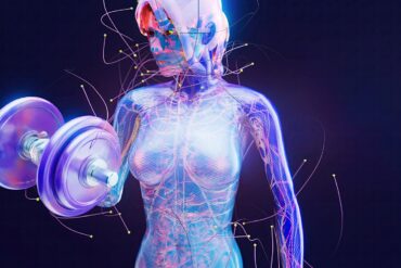 a woman is holding a barbell in her hand