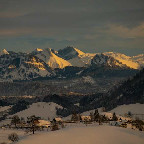 snow covered mountain during daytime
