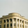 a large building with a clock on the front of it