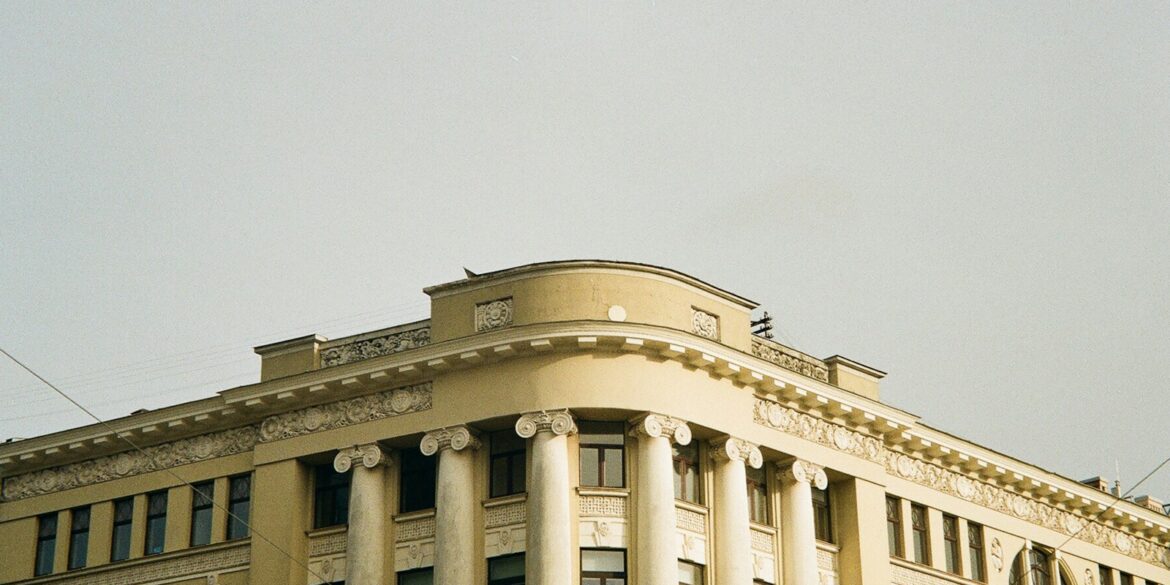 a large building with a clock on the front of it
