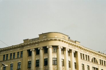 a large building with a clock on the front of it