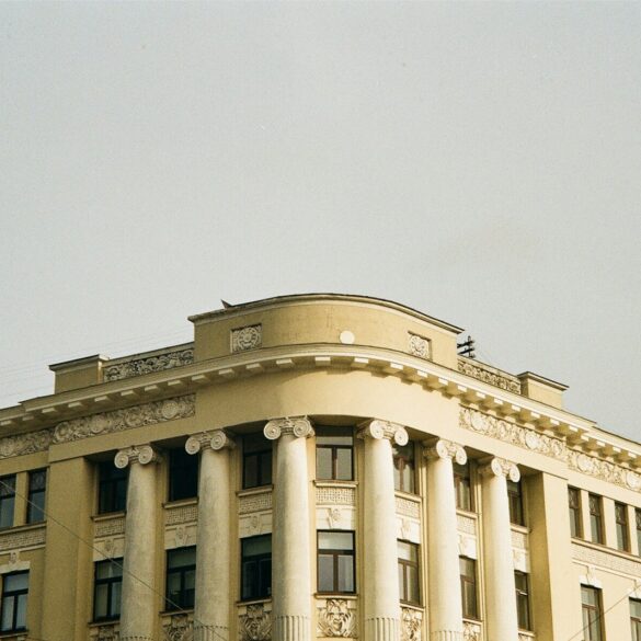 a large building with a clock on the front of it