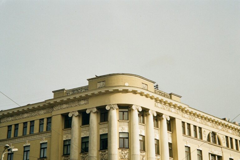 a large building with a clock on the front of it