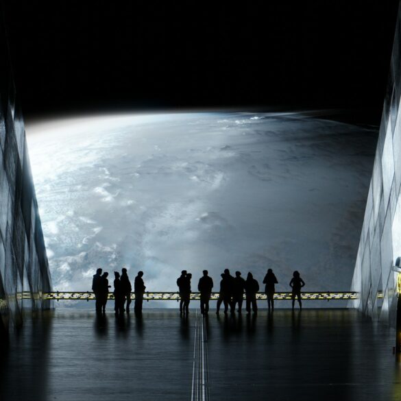 a group of people standing in a dark room