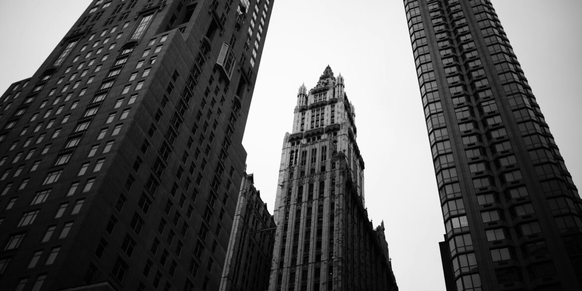 grayscale photo of high rise buildings