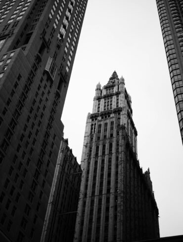 grayscale photo of high rise buildings