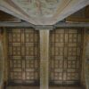 the ceiling of a building with decorative designs on it