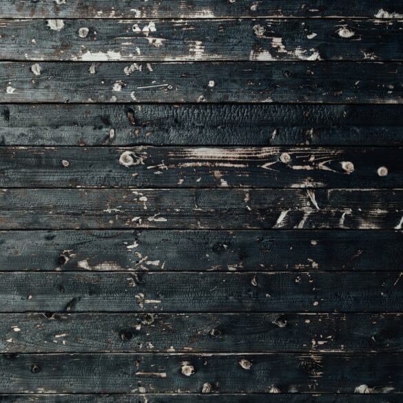 closeup photography of black wooden parquet partition