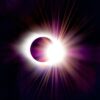 a solar eclipse is seen in the dark sky