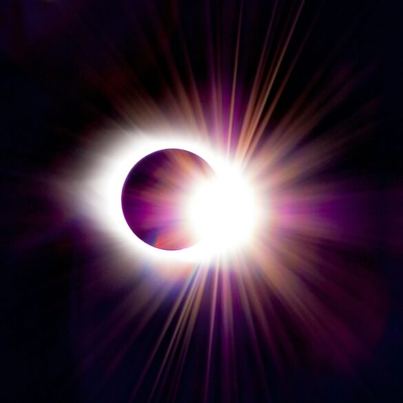 a solar eclipse is seen in the dark sky