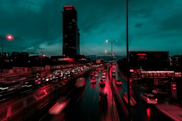 time lapse photography of cars on road during night time