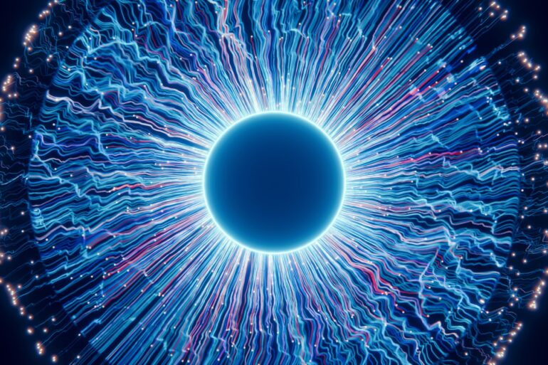 A close up of a blue eyeball in the dark