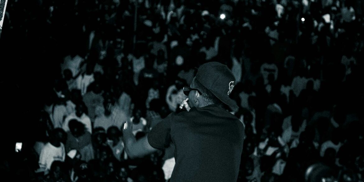 a man standing in front of a crowd of people