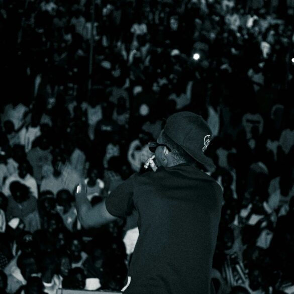 a man standing in front of a crowd of people