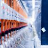 a row of orange and white electrical wires