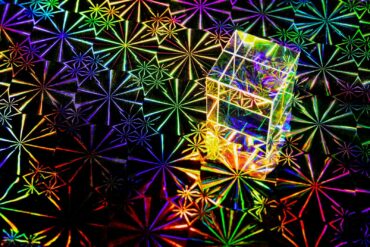 a multicolored picture of a chair in a room