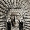 A carved stone native american chief's headdress
