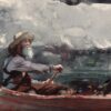 Man in canoe paddling through choppy water