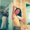 woman wearing white tank top