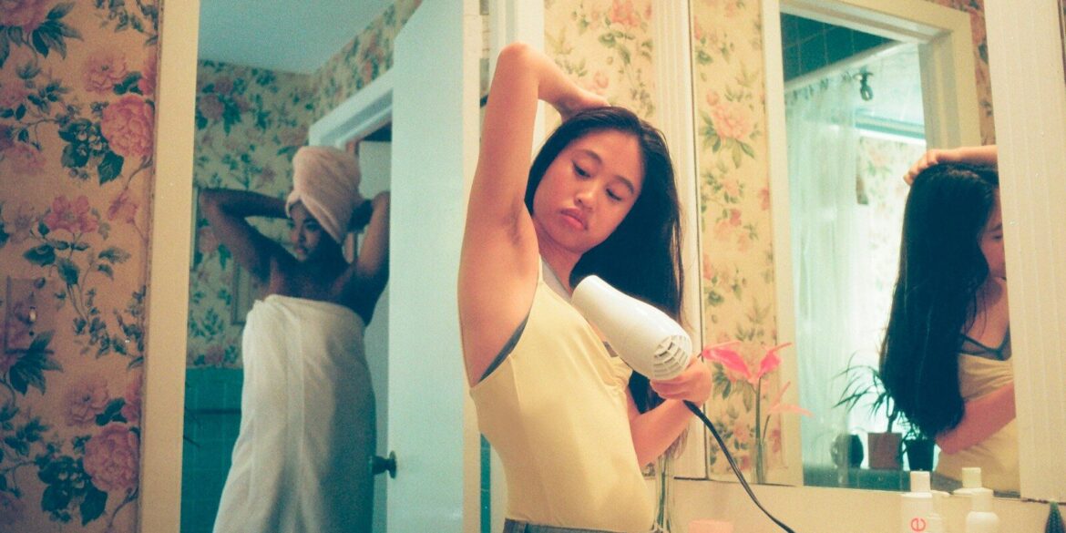 woman wearing white tank top