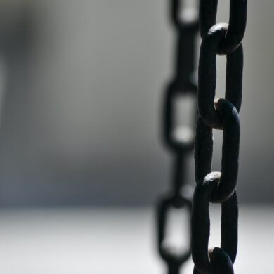 brown metal chain in close up photography