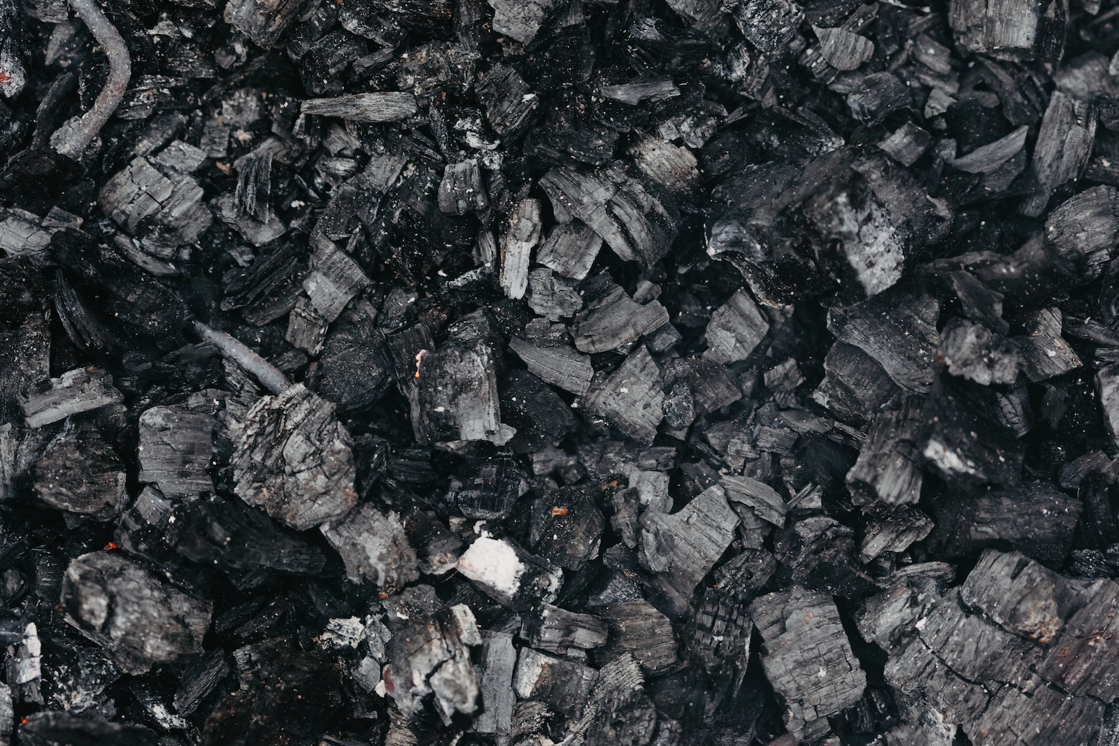 Backdrop of burnt coal with rugged surface