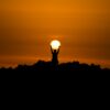 silhouette of person holding dun