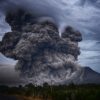 volcano eruption during daytime